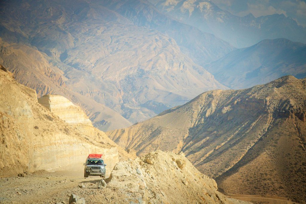 A stunning view of rugged mountains in Upper Mustang, Nepal, showcasing natural beauty.